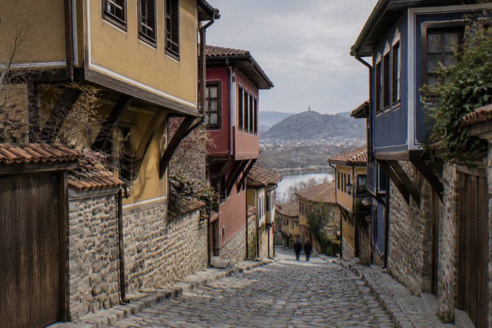 Narrow cobbled street in Plovdiv's Old Town lined with colourful revival-era houses