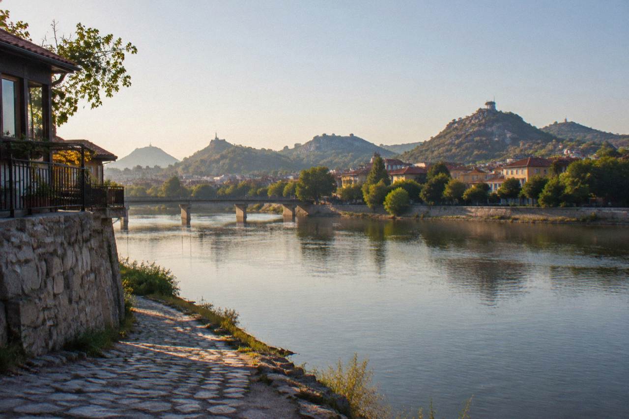 A view across the Maritsa river toward the hills and rooftops of central Plovdiv