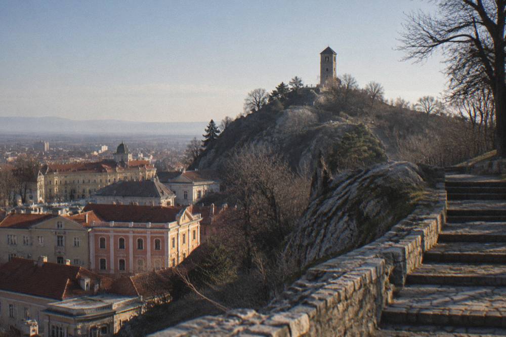 The clock tower on Sahat Tepe above the rooftops of central Plovdiv