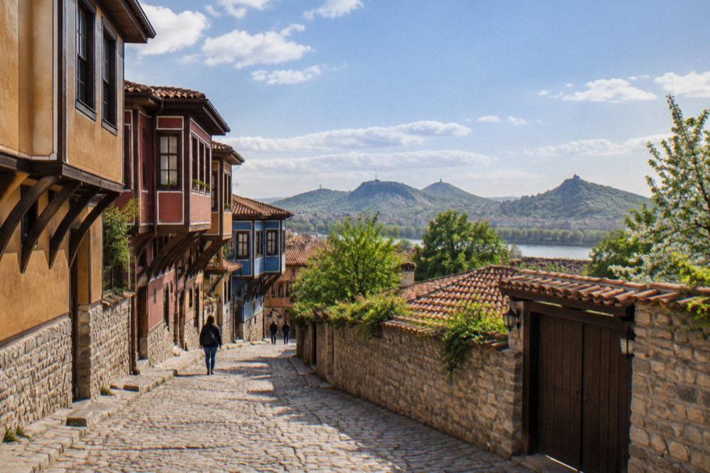 Walking lane in the Old Town of Plovdiv climbing between revival-era houses