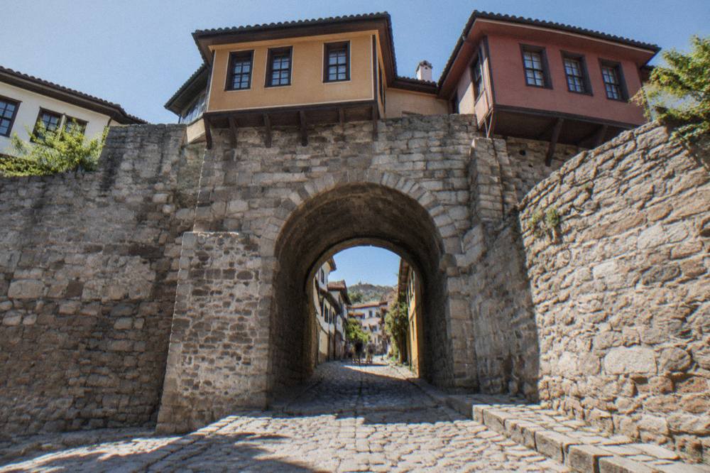 Stone gate of Hisar Kapia with Old Town houses above it