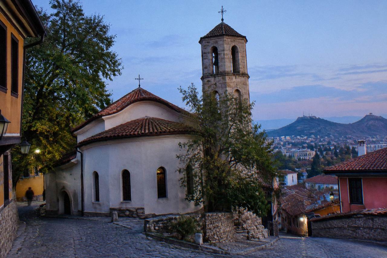 The Church of Saint Marina in Plovdiv with its stone bell tower rising above Old Town rooftops