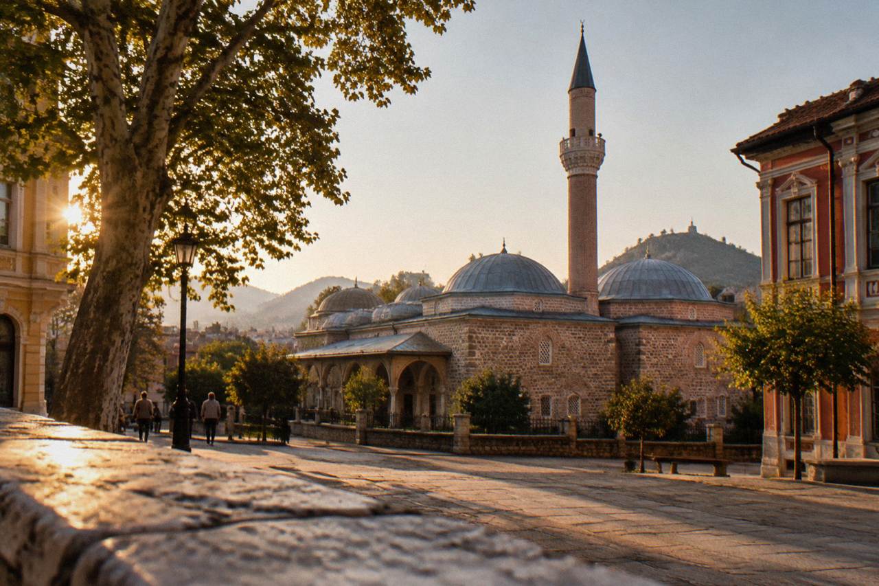 The Dzhumaya Mosque minaret and courtyard seen from a square in central Plovdiv