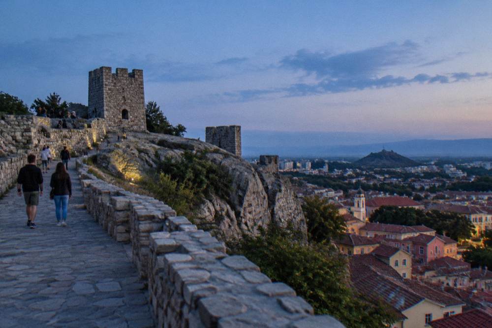 Visitors walking the open plateau of Nebet Tepe above Plovdiv Old Town