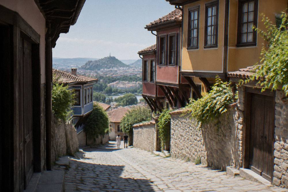 Cobbled old town street with colourful Bulgarian revival houses
