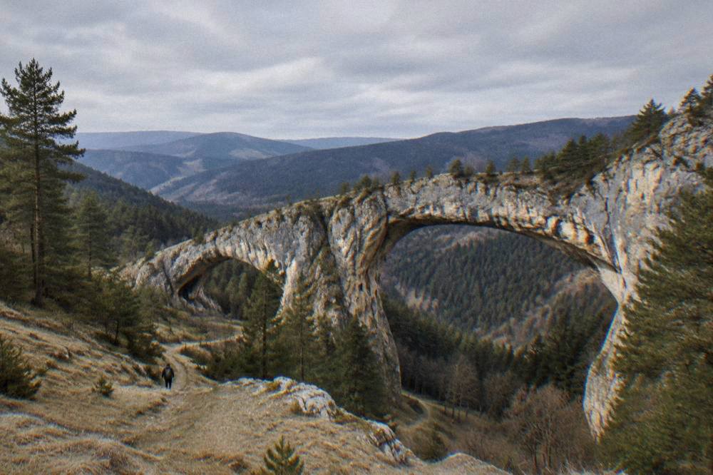 A wide view of forested mountain ridges stretching to the horizon in southern Bulgaria