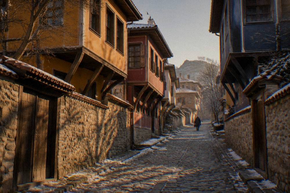 Empty cobblestone street in Plovdiv Old Town in soft winter light