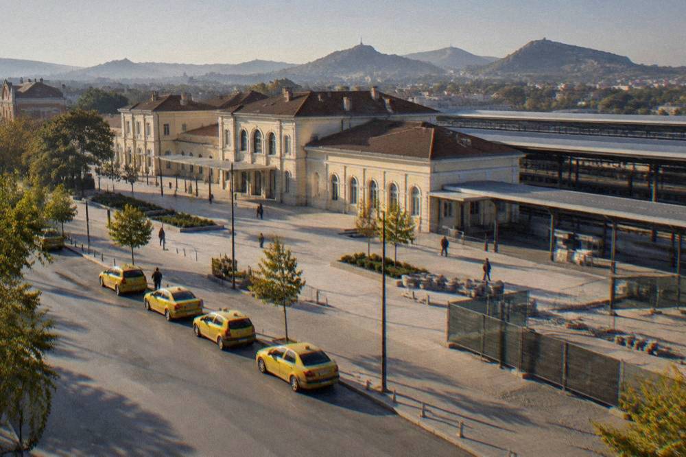 A line of taxis waiting on a city street in Plovdiv near the railway station