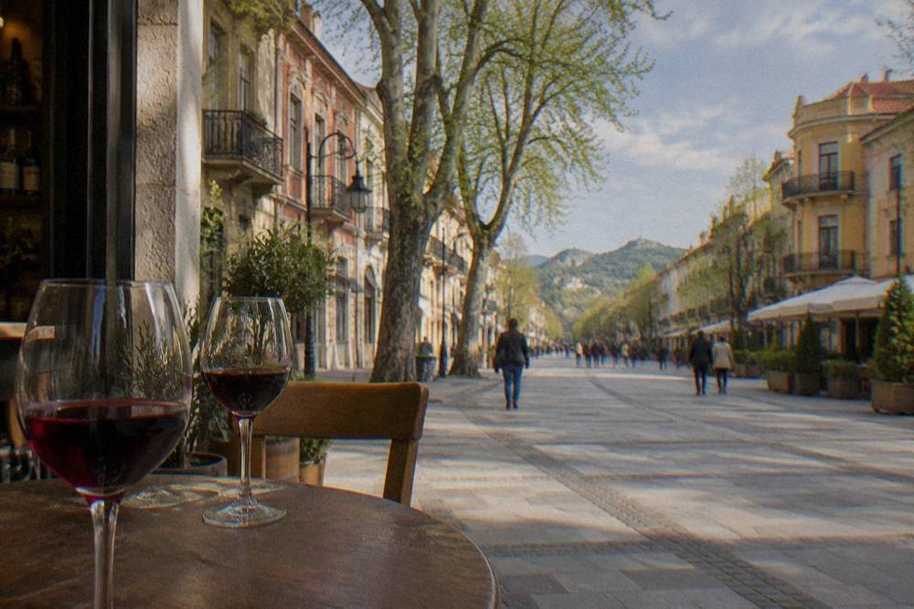 Glasses of red Bulgarian wine on a wooden table in a cozy tasting room