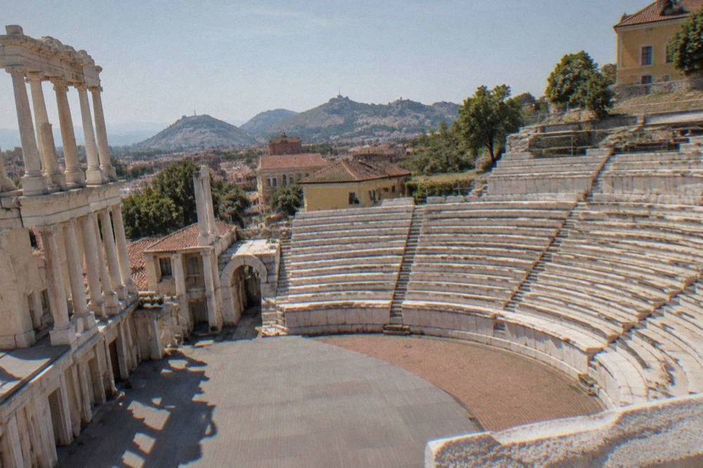 The marble seat rows of the Ancient Theatre of Philippopolis seen from the stage