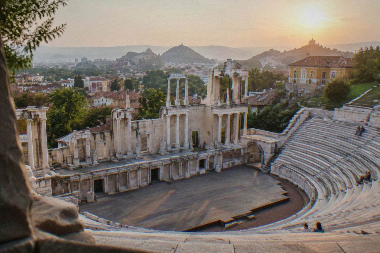 The Ancient Theatre of Philippopolis in Plovdiv with its marble rows of seats under an evening sky