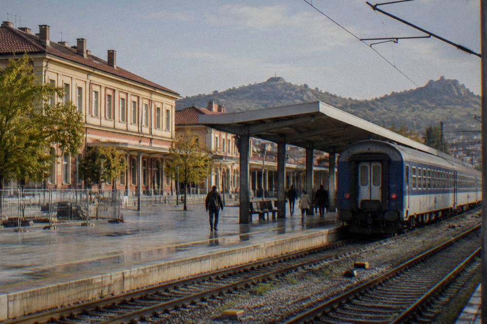 A railway platform with a passenger train at Plovdiv Central station