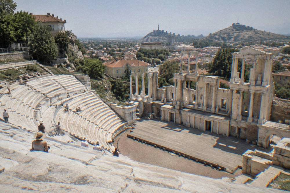 The marble seat rows of the Ancient Theatre of Philippopolis in morning light
