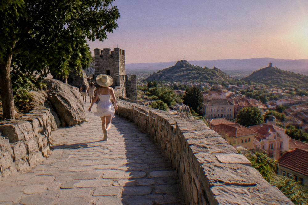 Nebet Tepe and the Three Hills of Plovdiv under a warm purple evening sky