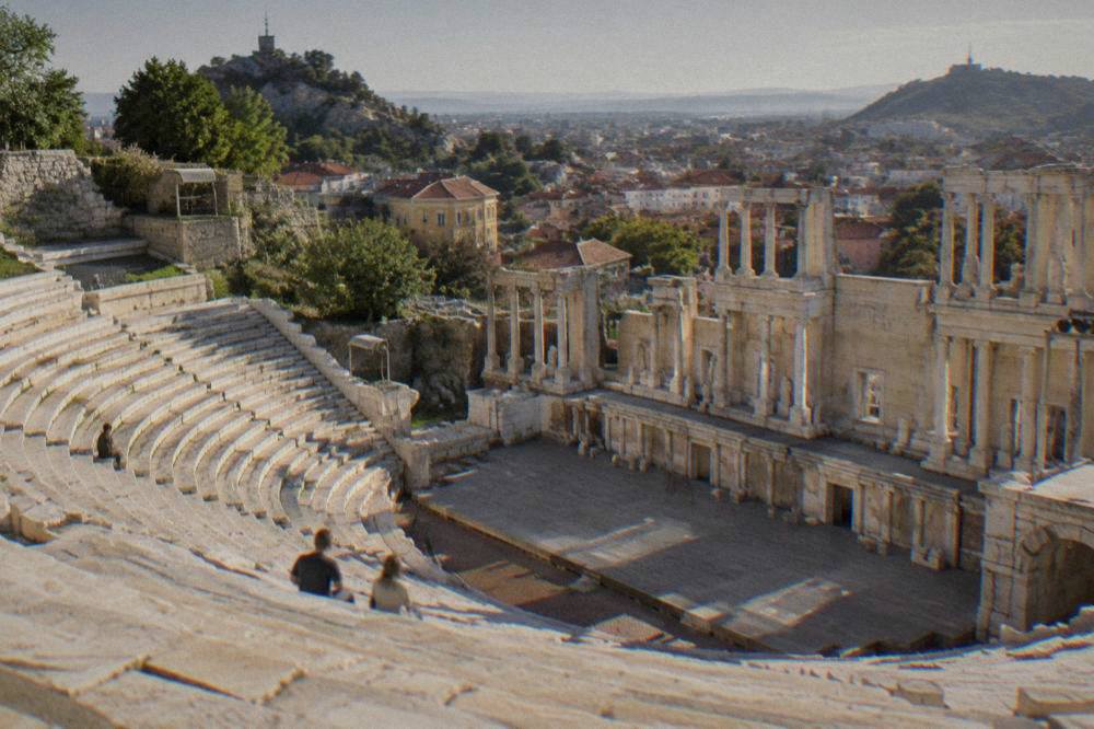 Ancient Roman theatre of Philippopolis with rows of marble seats seen from the stage
