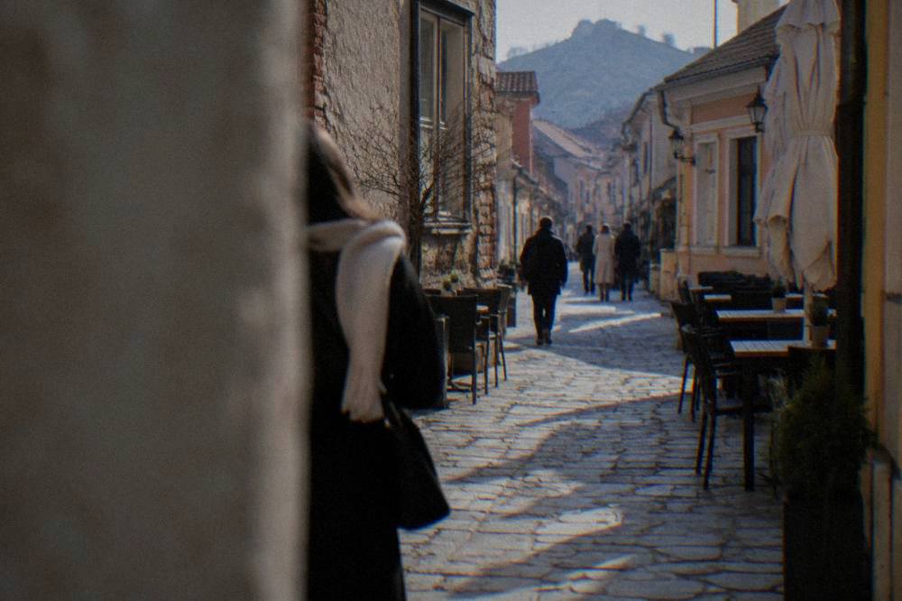 Visitors walking through the narrow streets of the Kapana creative district in Plovdiv