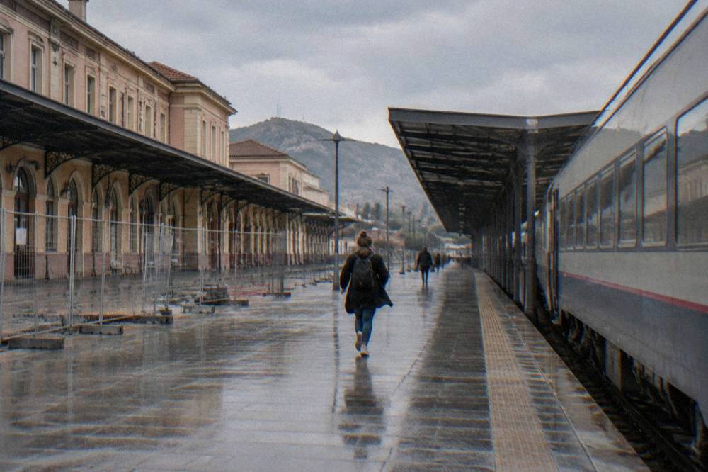 A train standing at Plovdiv central railway station platform
