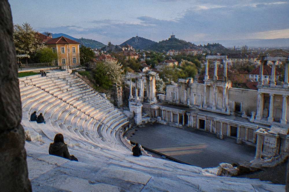 The marble seats of the Ancient Theatre of Philippopolis under a bright spring sky