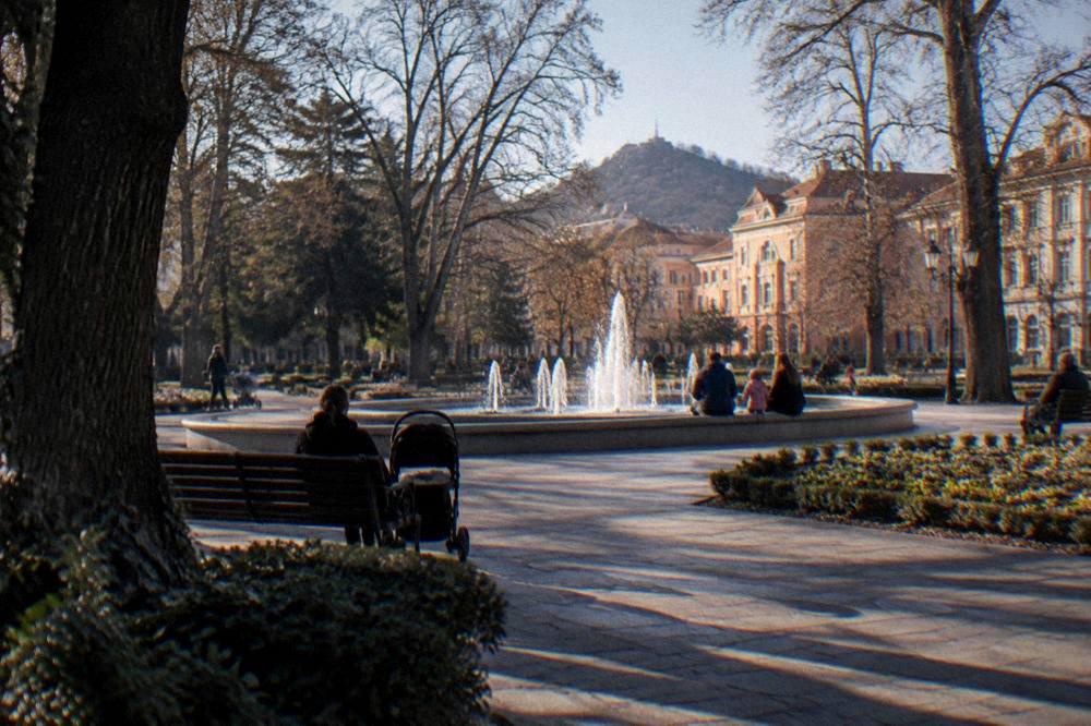 Families relaxing by the singing fountains in Tsar Simeon Garden in Plovdiv