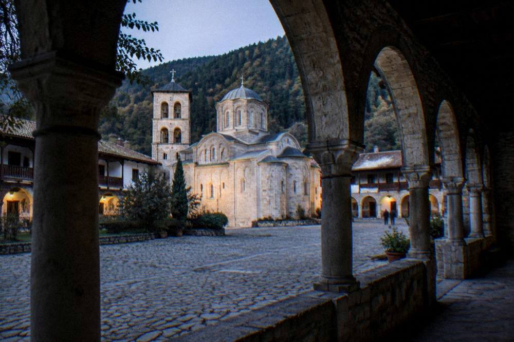 Stone arches of Bachkovo Monastery courtyard in the Rhodope foothills