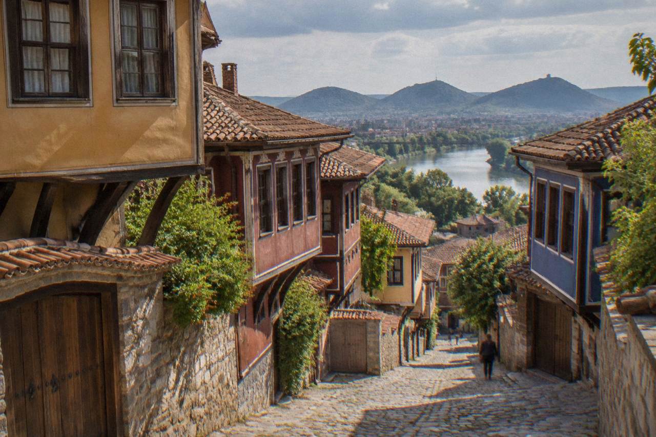 Cobblestone street lined with colourful Revival-era houses in Plovdiv Old Town