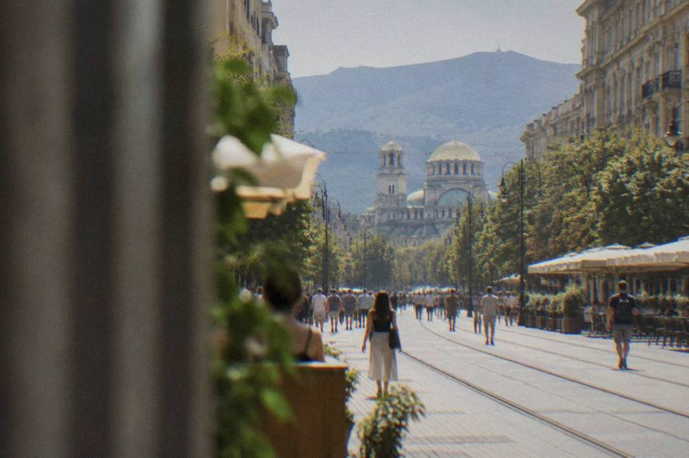 Sofia city centre with its large cathedral domes and a busy pedestrian boulevard