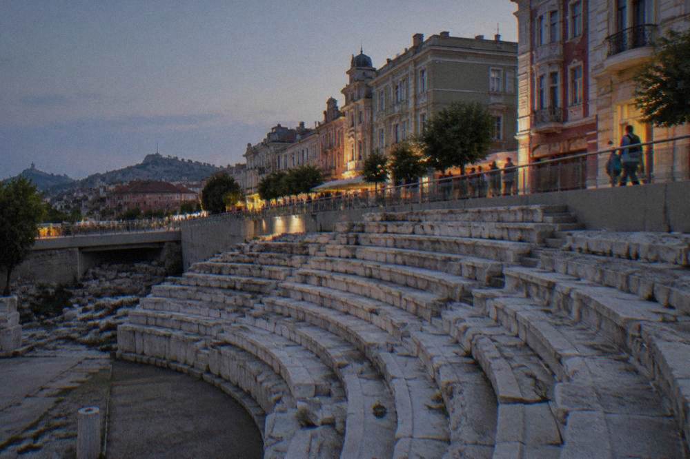 Ancient stone seating of the Roman Stadium sphendone beneath the modern Main Street of Plovdiv