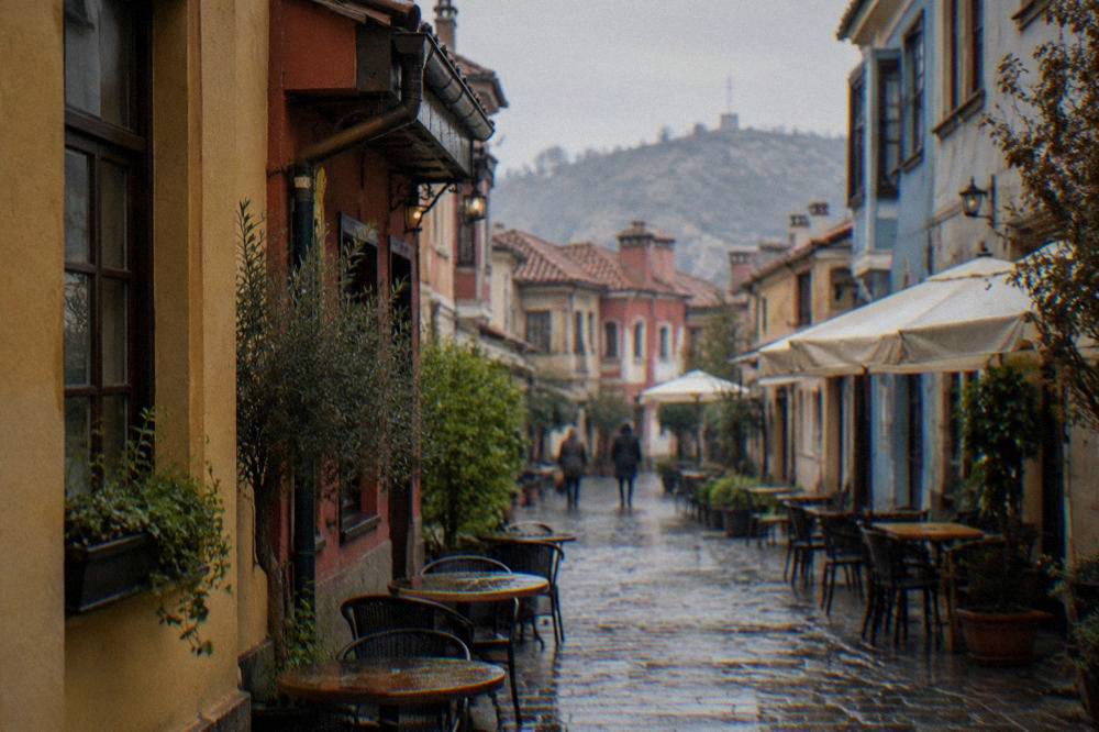 Narrow lane in the Kapana district with painted facades and small shops
