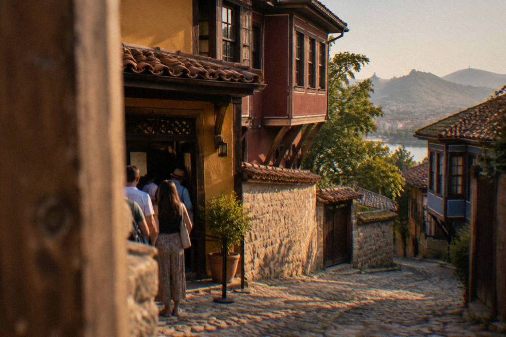 Visitors buying tickets at the entrance of a museum house in Plovdiv Old Town